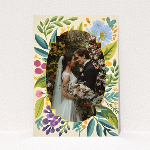 Wedding invitations design with floral border and a photo of a couple