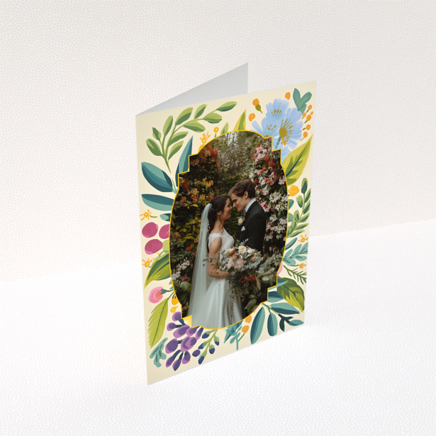 Wedding invitations design with floral border and a photo of a couple