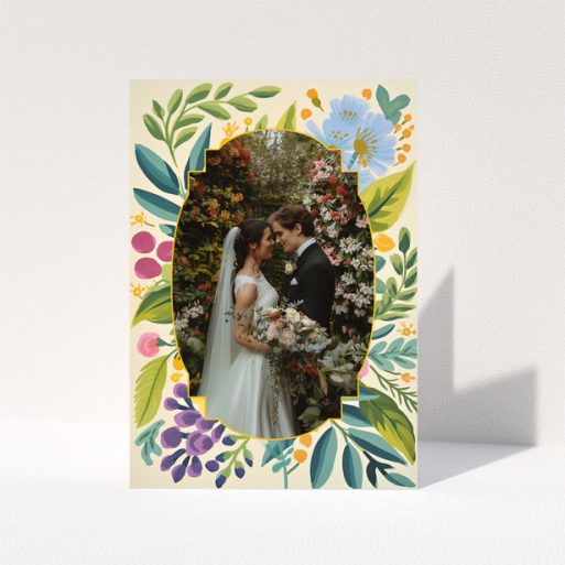 Wedding invitations design with floral border and a photo of a couple