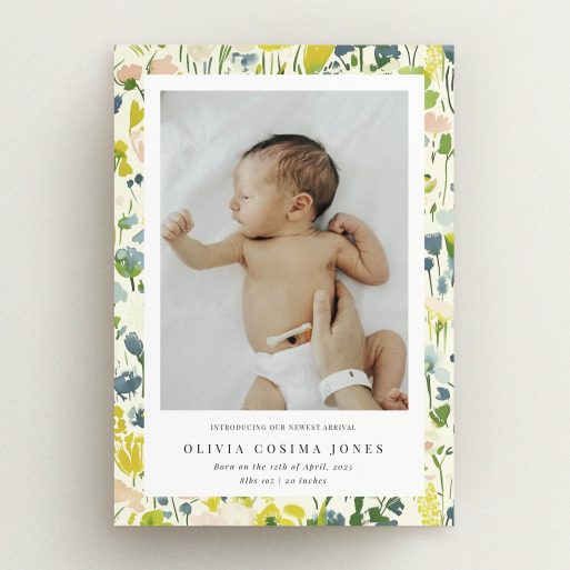 Floral birth announcement card with one baby photo.
