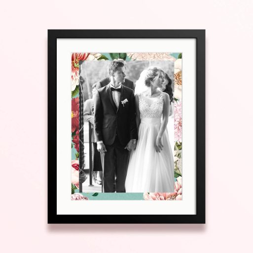 Framed and mounted photo print with a floral border and one photo of a couple.