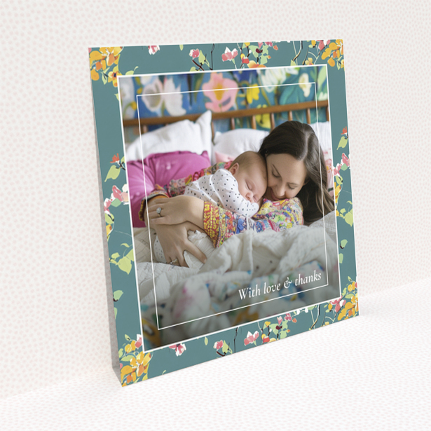 Floral baby thank you card with one photo of a mother and sleeping baby.
