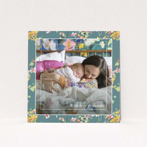 Floral baby thank you card with one photo of a mother and sleeping baby.