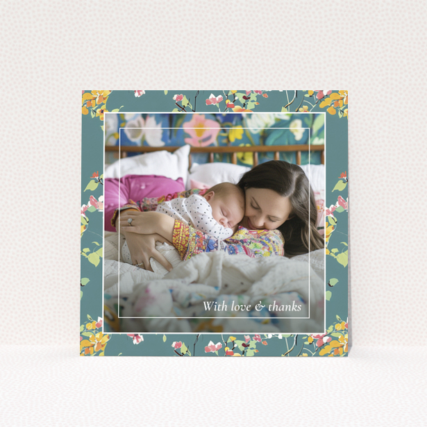 Floral baby thank you card with one photo of a mother and sleeping baby.