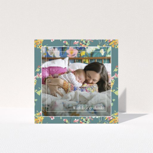 Floral baby thank you card with one photo of a mother and sleeping baby.