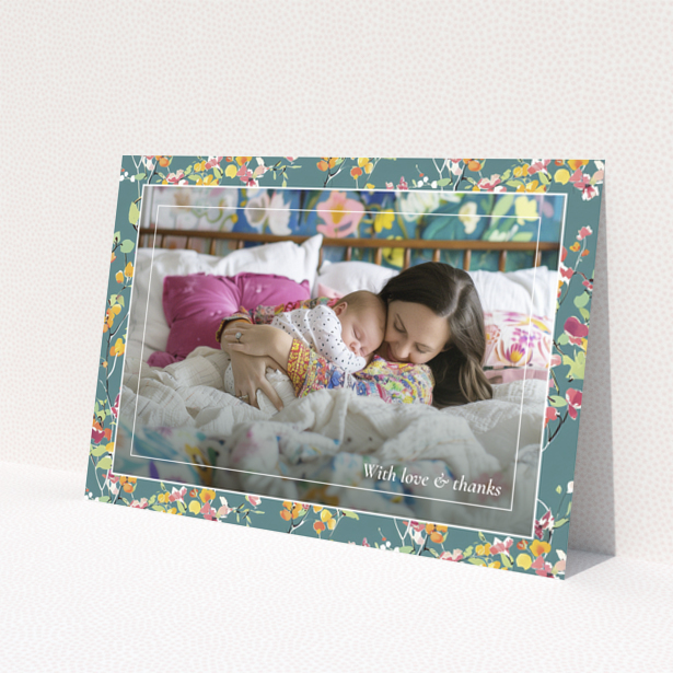 Floral baby thank you card with one photo of a mother and sleeping baby.