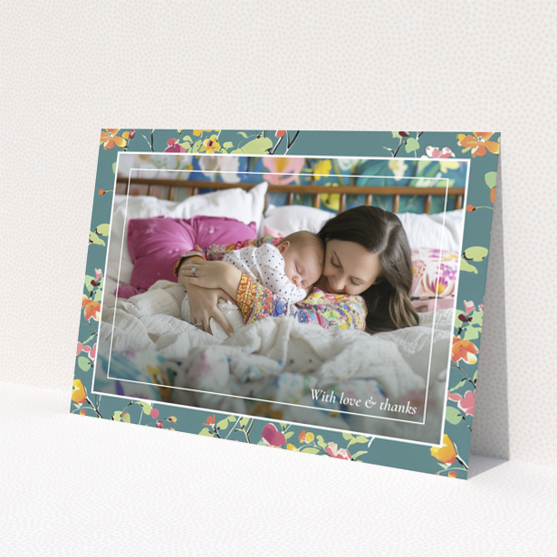 Floral baby thank you card with one photo of a mother and sleeping baby.