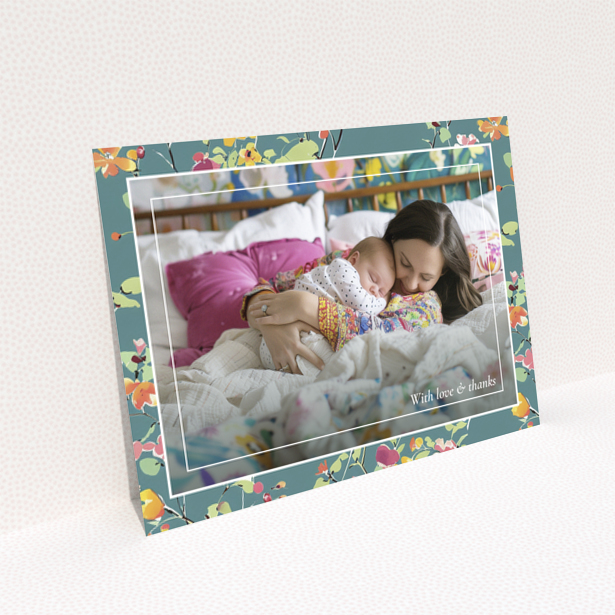 Floral baby thank you card with one photo of a mother and sleeping baby.