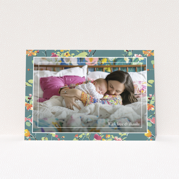 Floral baby thank you card with one photo of a mother and sleeping baby.