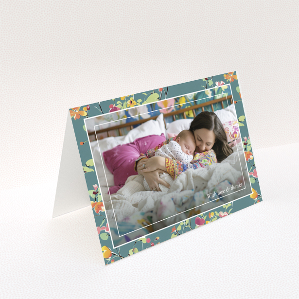 Floral baby thank you card with one photo of a mother and sleeping baby.