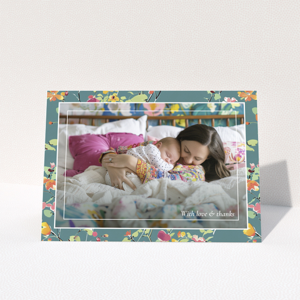 Floral baby thank you card with one photo of a mother and sleeping baby.
