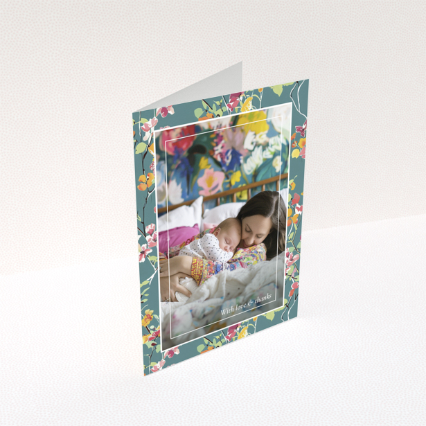 Floral baby thank you card with one photo of a mother and sleeping baby.