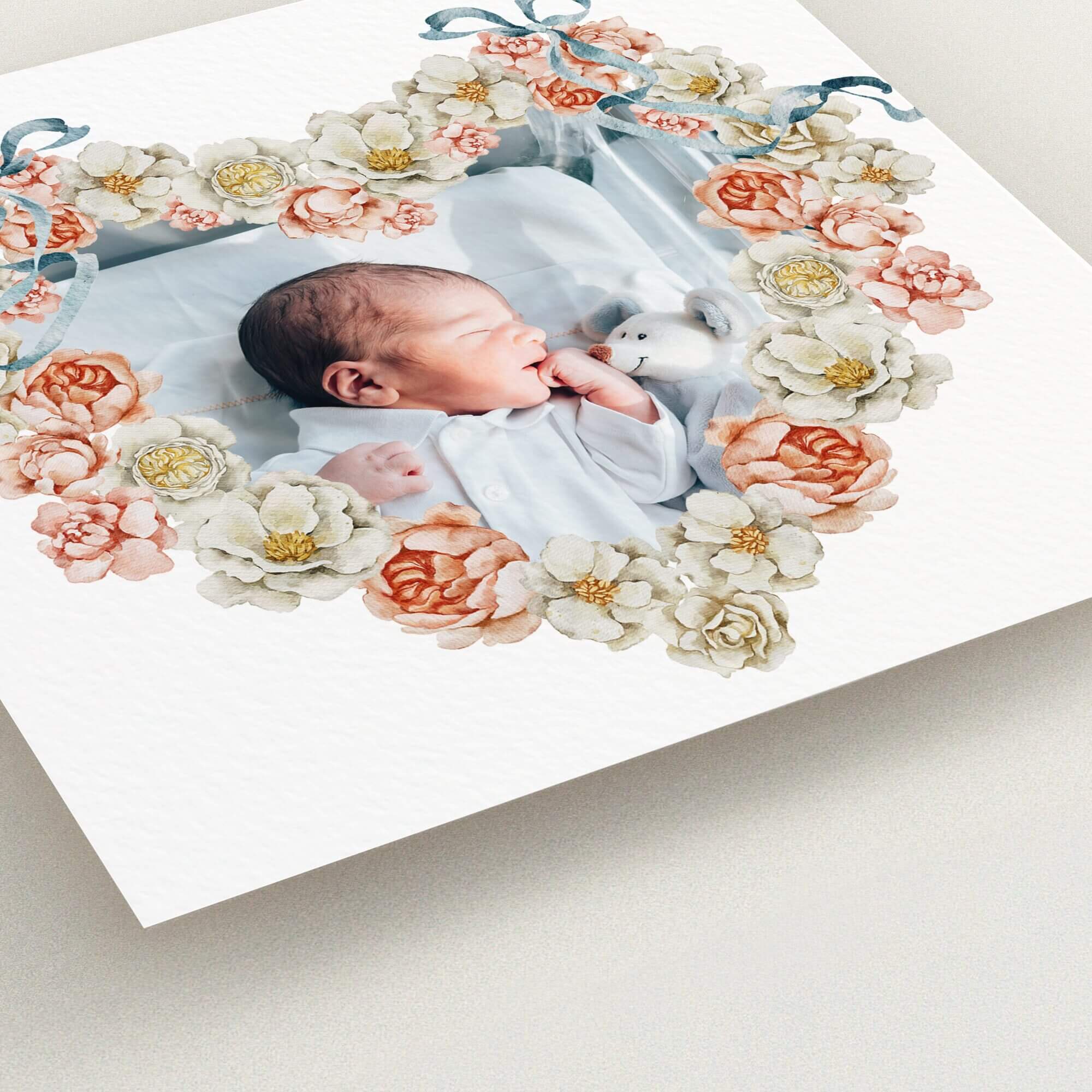 Floral heart christening invitation design with baby photo.