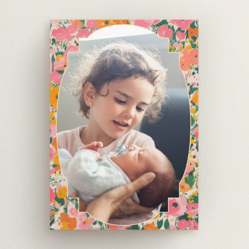 Floral birth announcement card design with one photo of siblings.