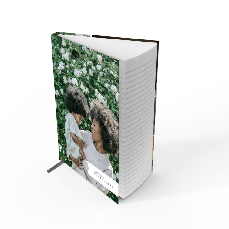 Portrait notebook design with floral background, featuring four photos on the cover spread.