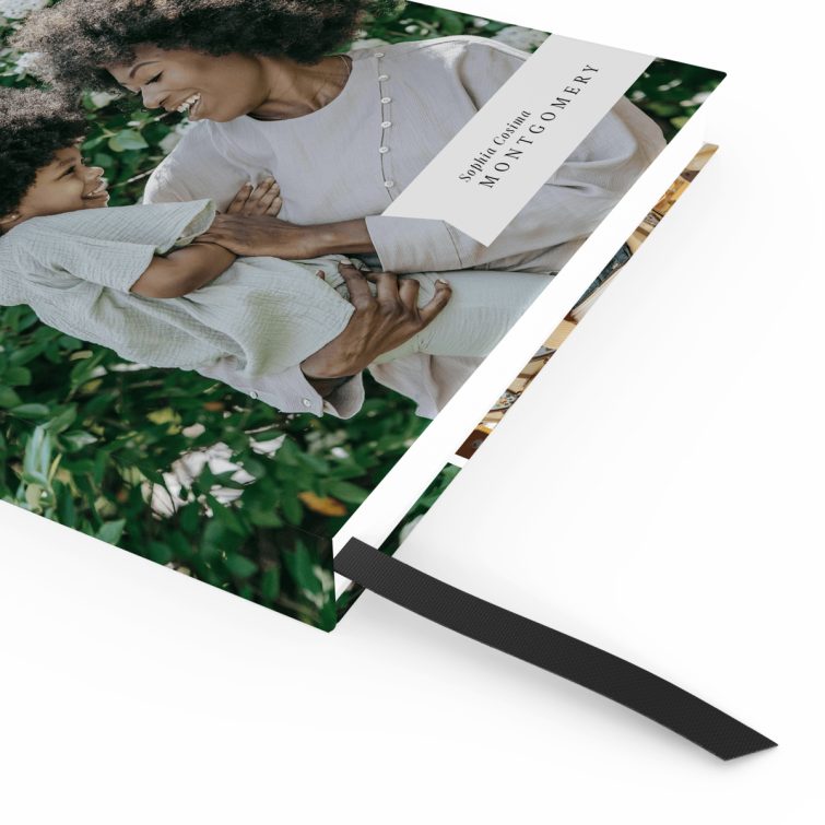 Portrait notebook design with floral background, featuring four photos on the cover spread.