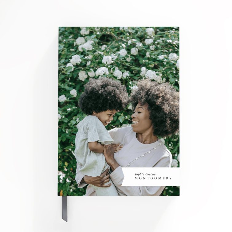 Portrait notebook design with floral background, featuring four photos on the cover spread.