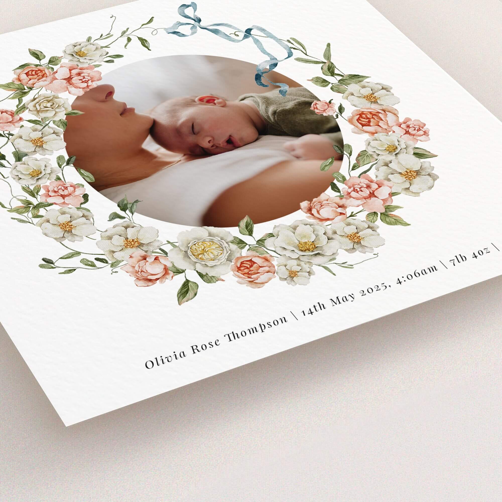 Floral birth announcement card design with one circular photo of a mother and baby.