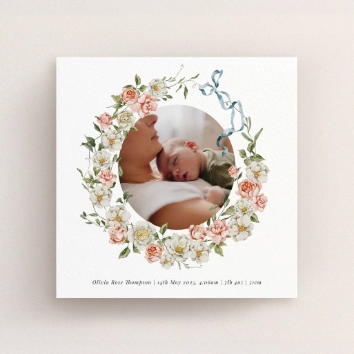 Floral birth announcement card design with one circular photo of a mother and baby.