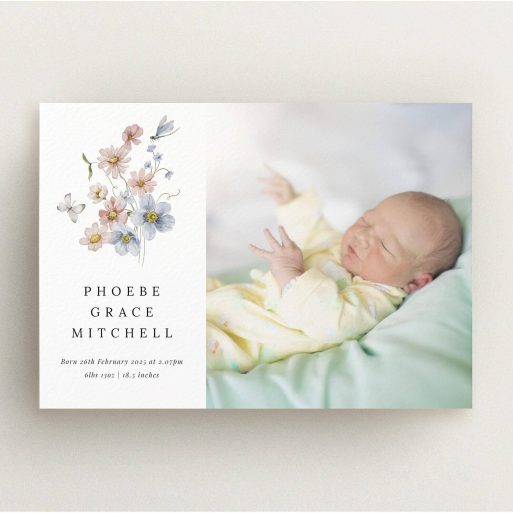 Floral birth announcement card with one baby photo on the right side.