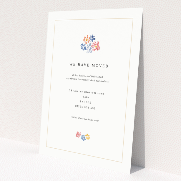 Change of address card with floral design and one decorative photo