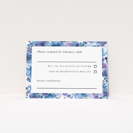 RSVP card from the Blue Anemones suite, inspired by nature's beauty, showcasing anemone flowers in varying shades of blue, exuding elegance and sophistication, perfect for couples seeking a vibrant yet refined aesthetic, setting the tone for a memorable and stylish celebration This is a view of the front
