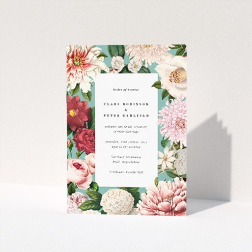 "Blue Blossom wedding order of service booklet featuring richly detailed botanical illustrations in shades of pink, red, and white against a serene blue backdrop, ideal for couples seeking floral splendour for their wedding ceremony.". This is a view of the front