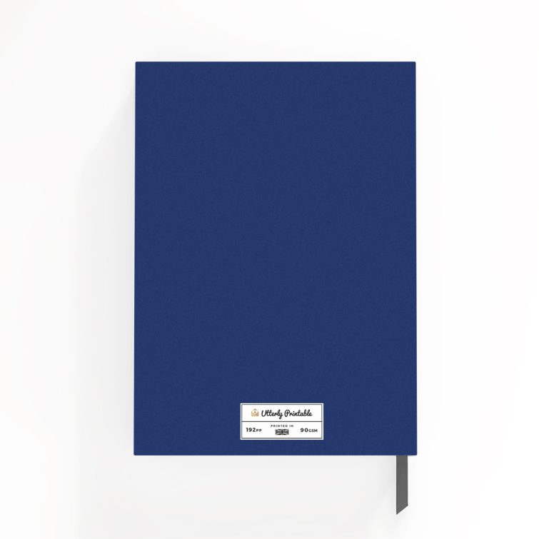 Portrait-oriented customisable notebook cover design with two photos, featuring a blue pattern.