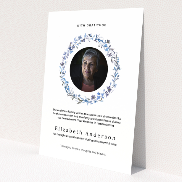 Funeral thank you card with floral wreath and photo of deceased