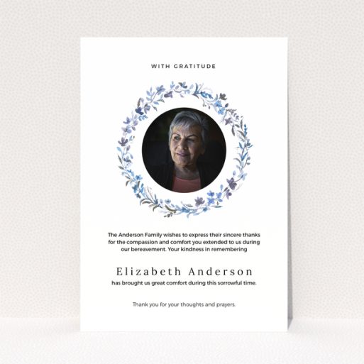 Funeral thank you card with floral wreath and photo of deceased