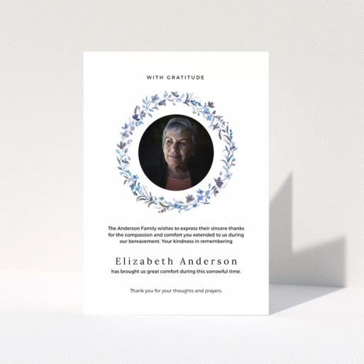 Funeral thank you card with floral wreath and photo of deceased