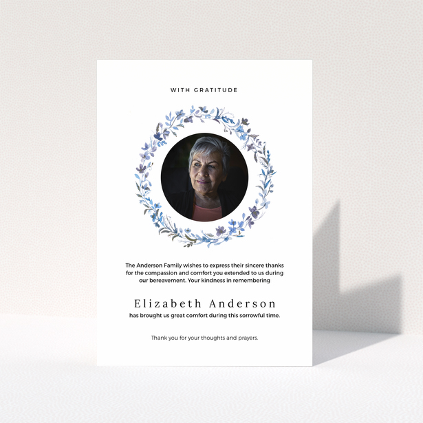 Funeral thank you card with floral wreath and photo of deceased