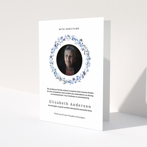 Funeral thank you card with floral wreath and photo of deceased