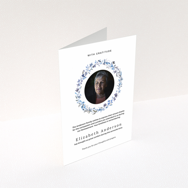 Funeral thank you card with floral wreath and photo of deceased