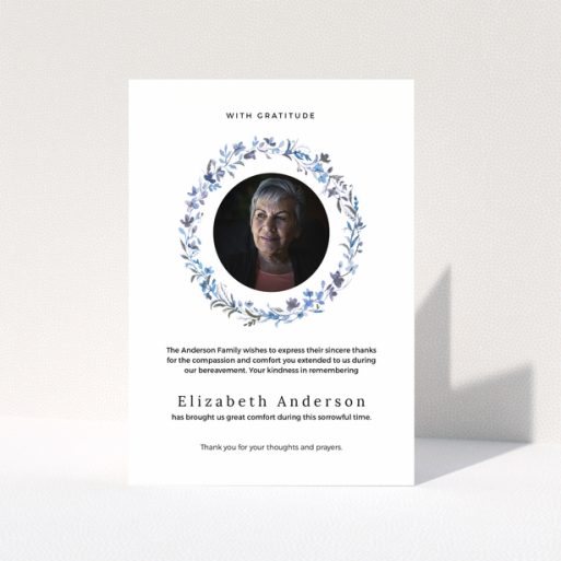 Funeral thank you card with floral wreath and photo of deceased