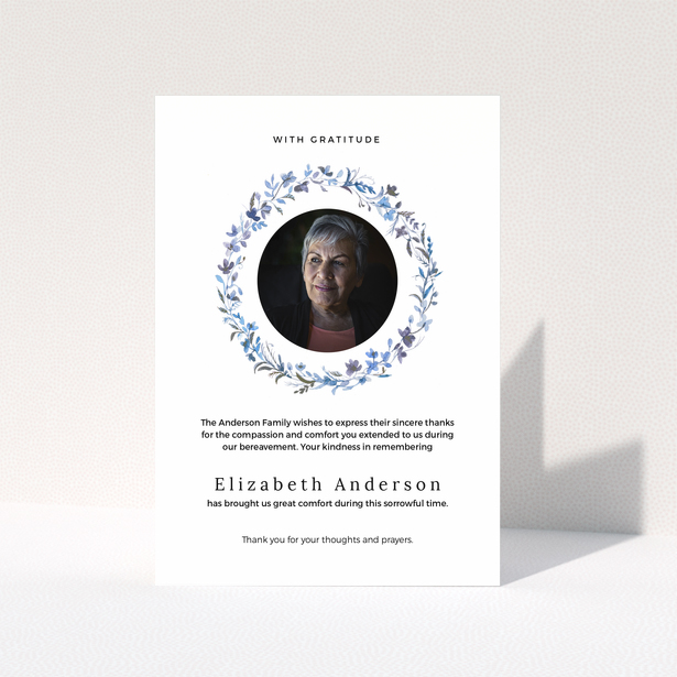 Funeral thank you card with floral wreath and photo of deceased