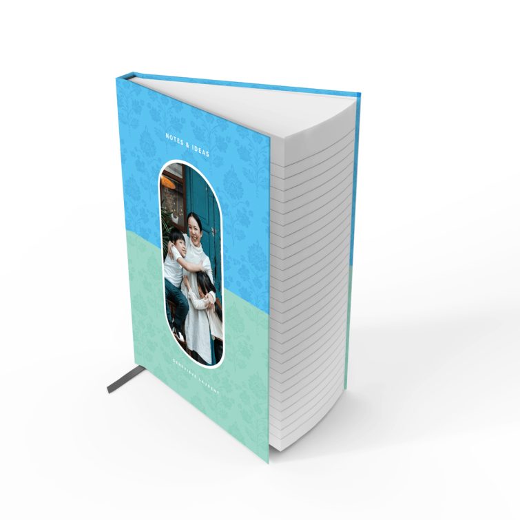 Floral design portrait notebook cover with one photo on the front.