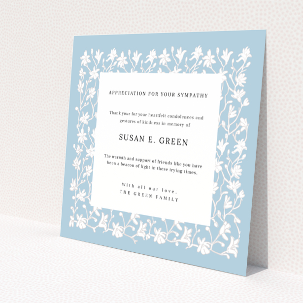 Floral funeral thank you card design with blue background and white flowers