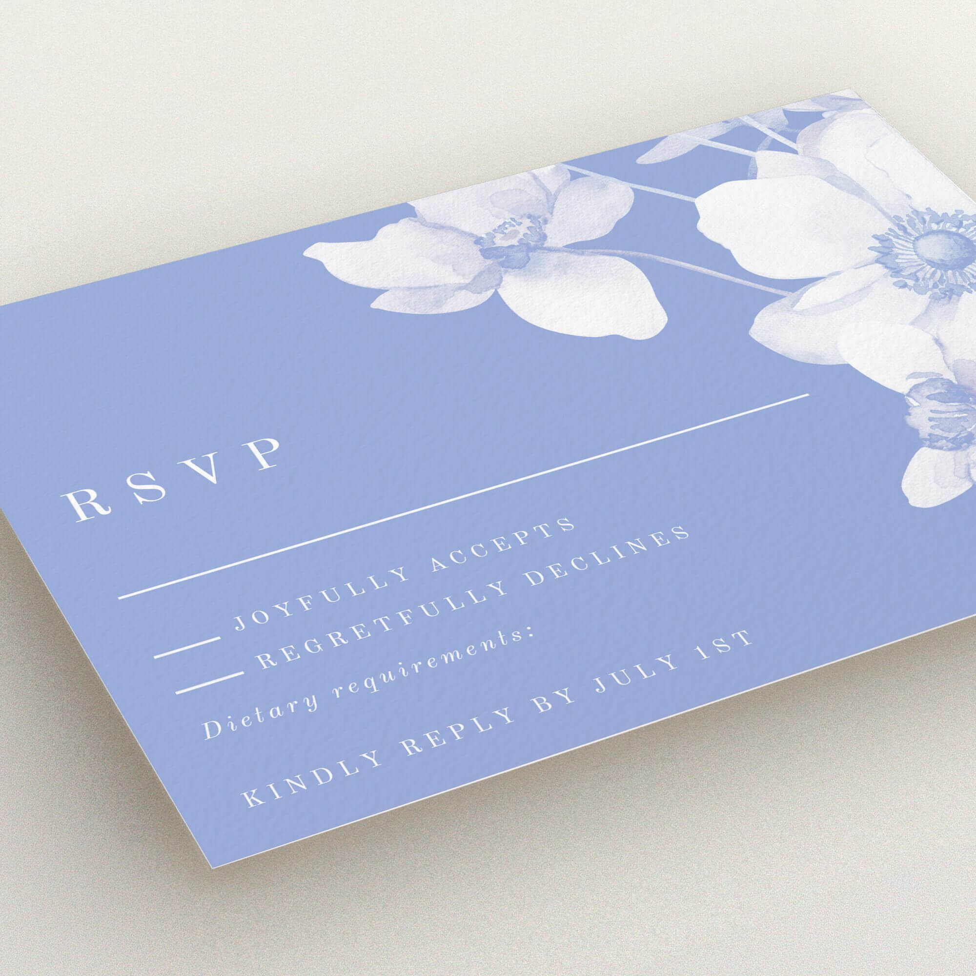 Elegant floral wedding RSVP card with one decorative flower design.
