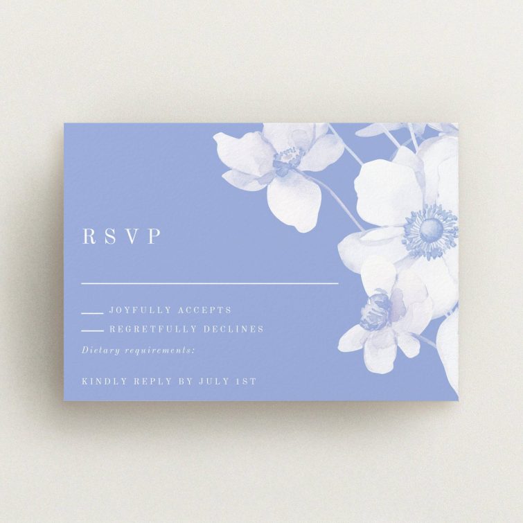 Elegant floral wedding RSVP card with one decorative flower design.