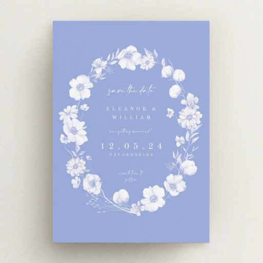 Floral wedding save the date card design with blue background, featuring elegant typography and no photos.