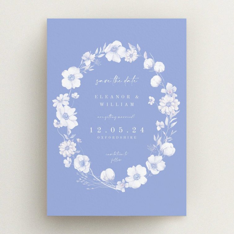 Floral wedding save the date card design with blue background, featuring elegant typography and no photos.