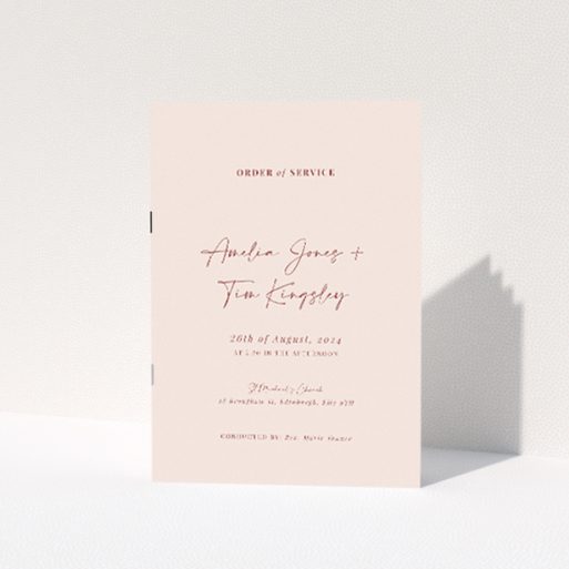"Blush Elegance Script Wedding Order of Service A5 Booklet - Sophisticated design with blush background and graceful script font, ideal for modern weddings.". This is a view of the front