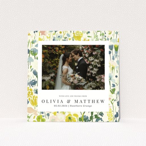 Wedding thank you card with floral design featuring personalised text and one wedding photo