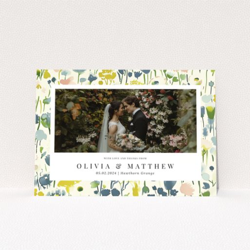Wedding thank you card with floral design featuring personalised text and one wedding photo