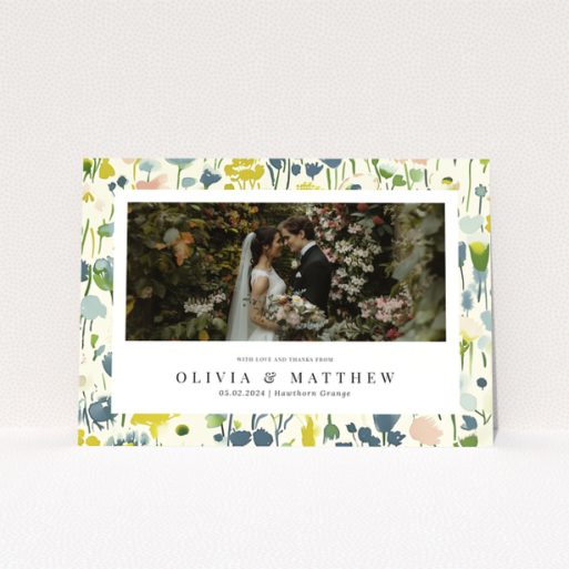 Wedding thank you card with floral design featuring personalised text and one wedding photo