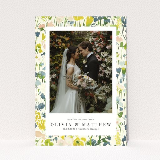 Wedding thank you card with floral design featuring personalised text and one wedding photo