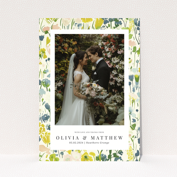 Wedding thank you card with floral design featuring personalised text and one wedding photo