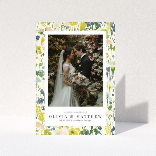 Wedding thank you card with floral design featuring personalised text and one wedding photo