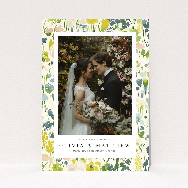 Wedding thank you card with floral design featuring personalised text and one wedding photo